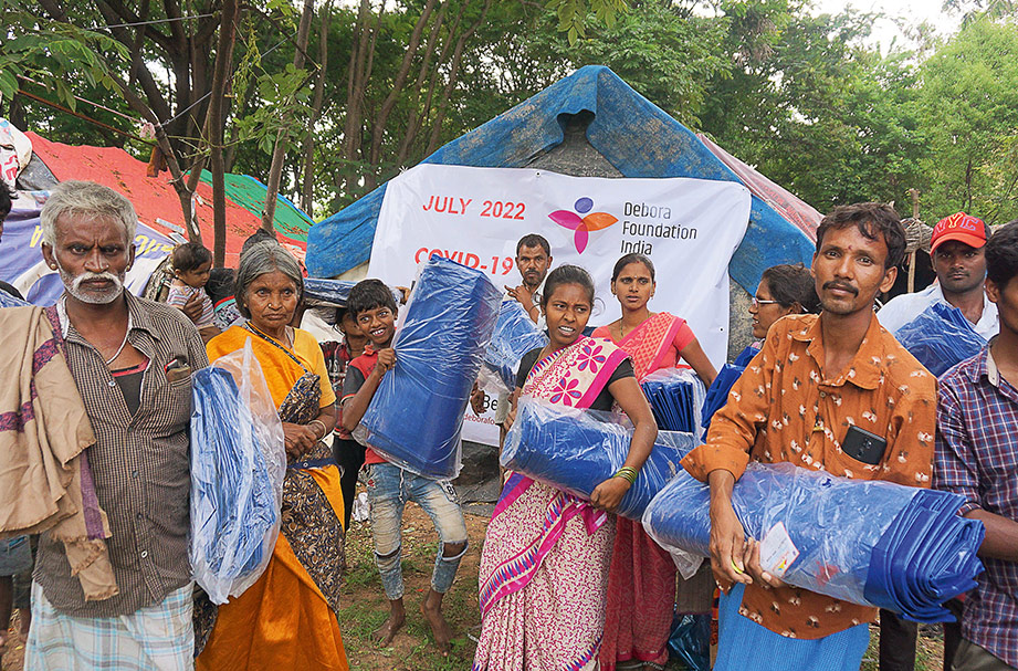 The Debora Foundation provides landless people with heavy-duty tarpaulins.